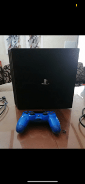 PlayStation 4 Pro 1TB + mando + juegos + cables