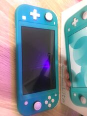 Nintendo Switch Lite, Turquoise, 32GB + Base de carga Nintendo Switch