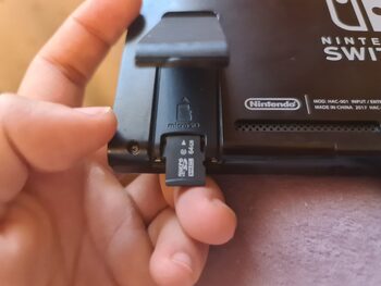 Get Nintendo switch + tarjeta 64