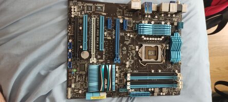 Asus P8P67 PRO (REV 3.1) Intel P67 ATX DDR3 LGA1155 3 x PCI-E x16 Slots Motherboard for sale