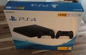 Get Ps4 slim 1T + 4 juegos
