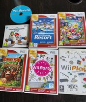 Redeem Nintendo Wii mini + 2 mandos + juegos
