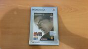 PS2 plateada + 6 juegos