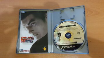 PS2 plateada + 6 juegos