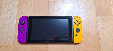Nintendo Switch, Orange and Purple 64GB + Splatoon Cover