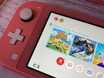 Redeem Nintendo Switch Lite Animal crossing casi nueva 