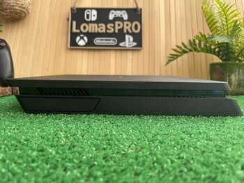 PlayStation 4 Slim 1TB + mando V2 COMO NUEVA!