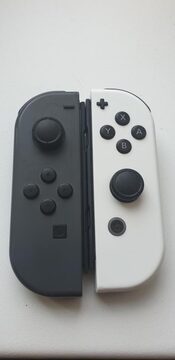 Gray and White Joycons (Gray Joycon drifts)(White Joycons Y button is mushy)