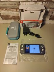 Nintendo Switch Lite Gris + Caja + Funda