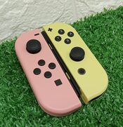 Joycons originales Rosa / amarillo pastel