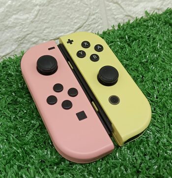 Joycons originales Rosa / amarillo pastel