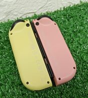 Joycons originales Rosa / amarillo pastel