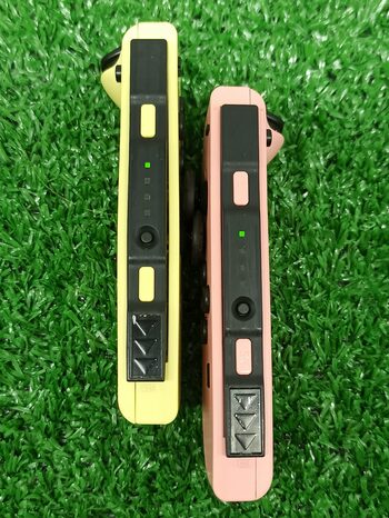 Joycons originales Rosa / amarillo pastel