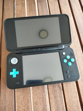 NEW NINTENDO 2DS XL + EXTRAS for sale