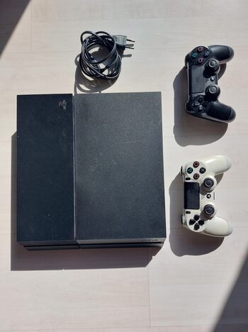 PlayStation 4, Black, 500GB With 2 controllers.